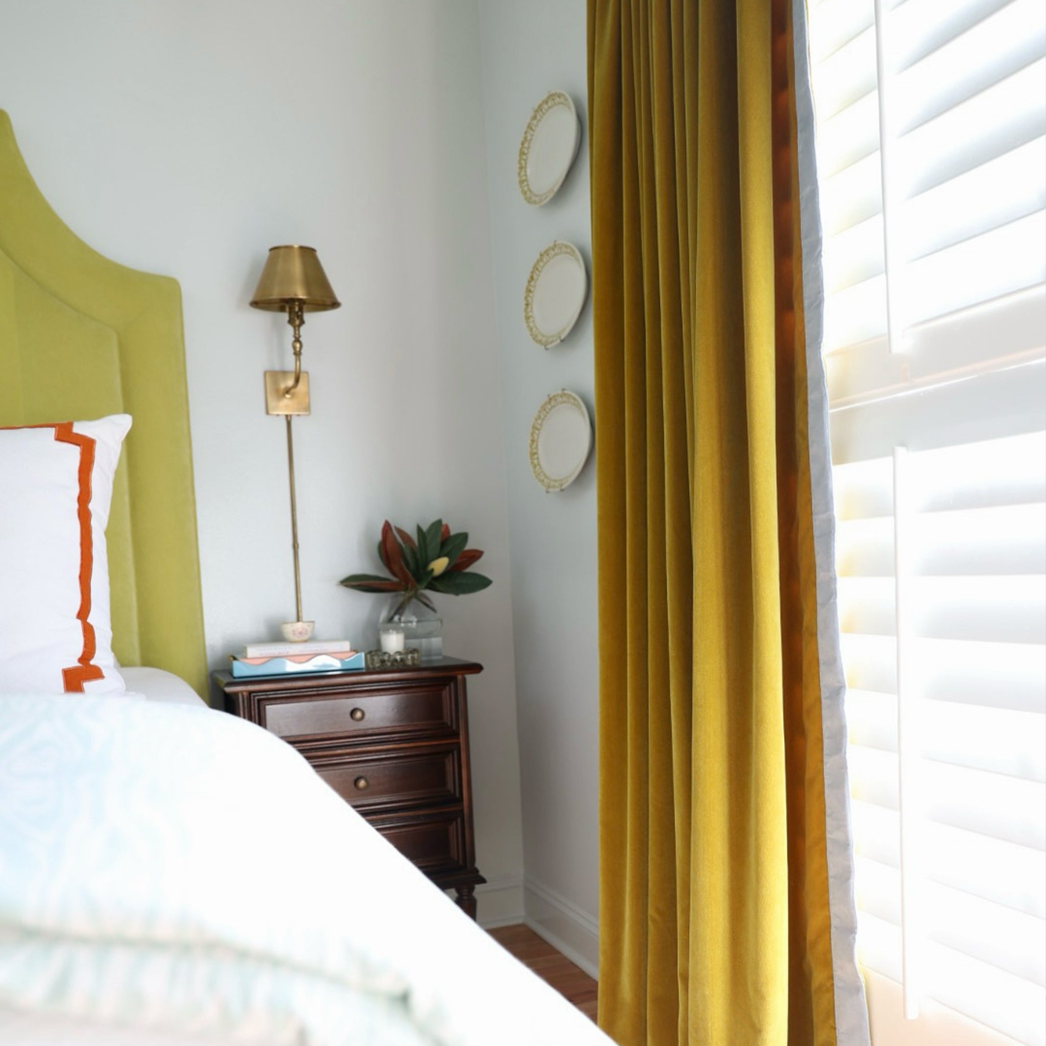 Citron custom velvet curtains from Pepper Home adding warmth and style to your room’s decor with a perfect pop of color.