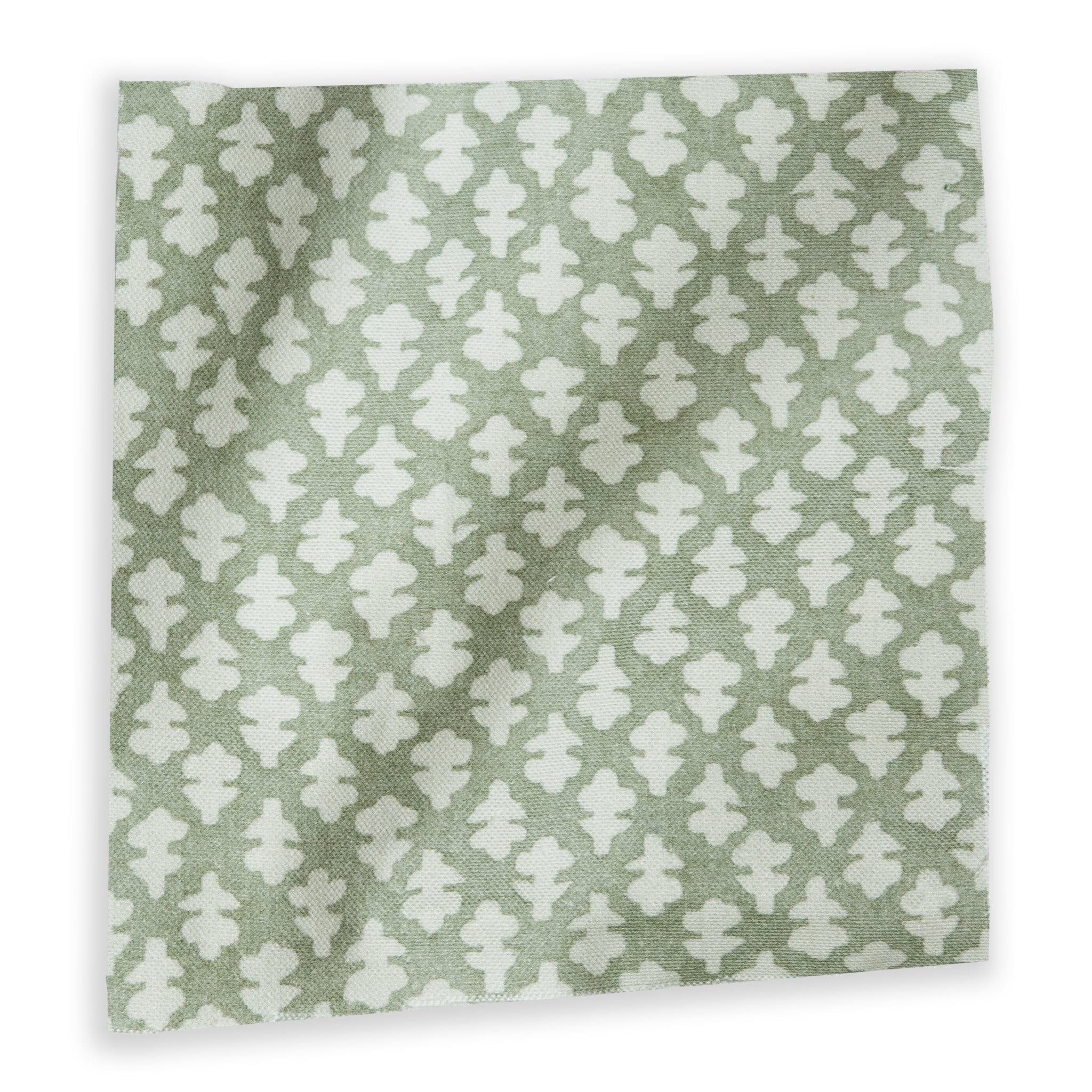 Quinn Eucalyptus fabric featuring a soft green tone with a subtle white leaf pattern in a quality, customizable cotton weave.