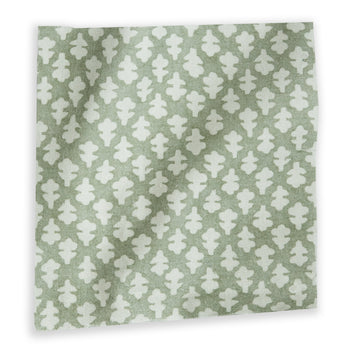Quinn Eucalyptus fabric featuring a soft green tone with a subtle white leaf pattern in a quality, customizable cotton weave.