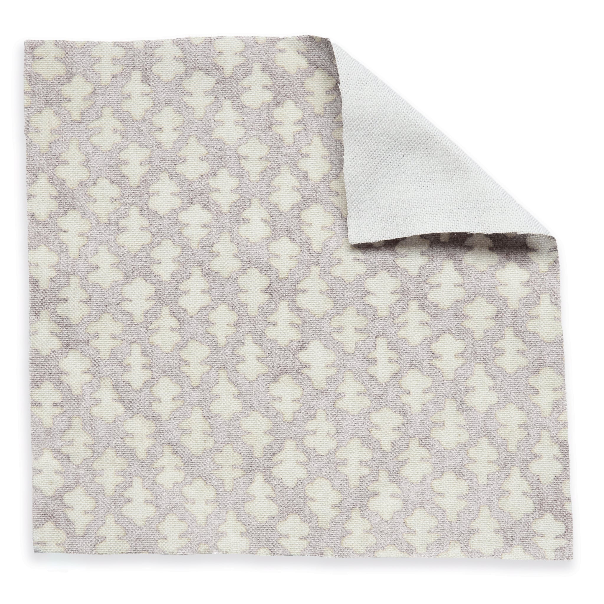 Quinn Wisteria fabric in soft lavender with an elegant white geometric pattern, customizable and made-to-order quality cotton.
