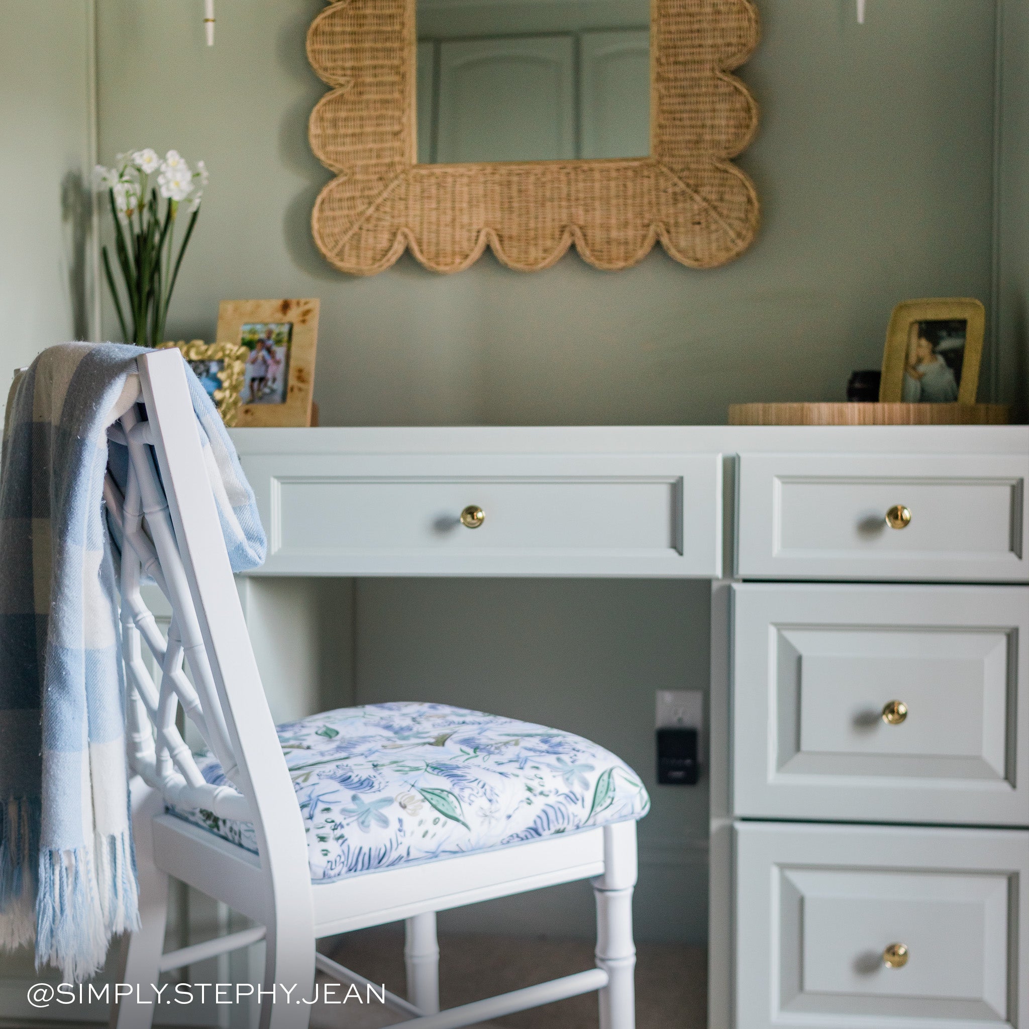 Frida Green fabric upholstered chair with floral pattern beside white desk, made-to-order in the USA with short lead times