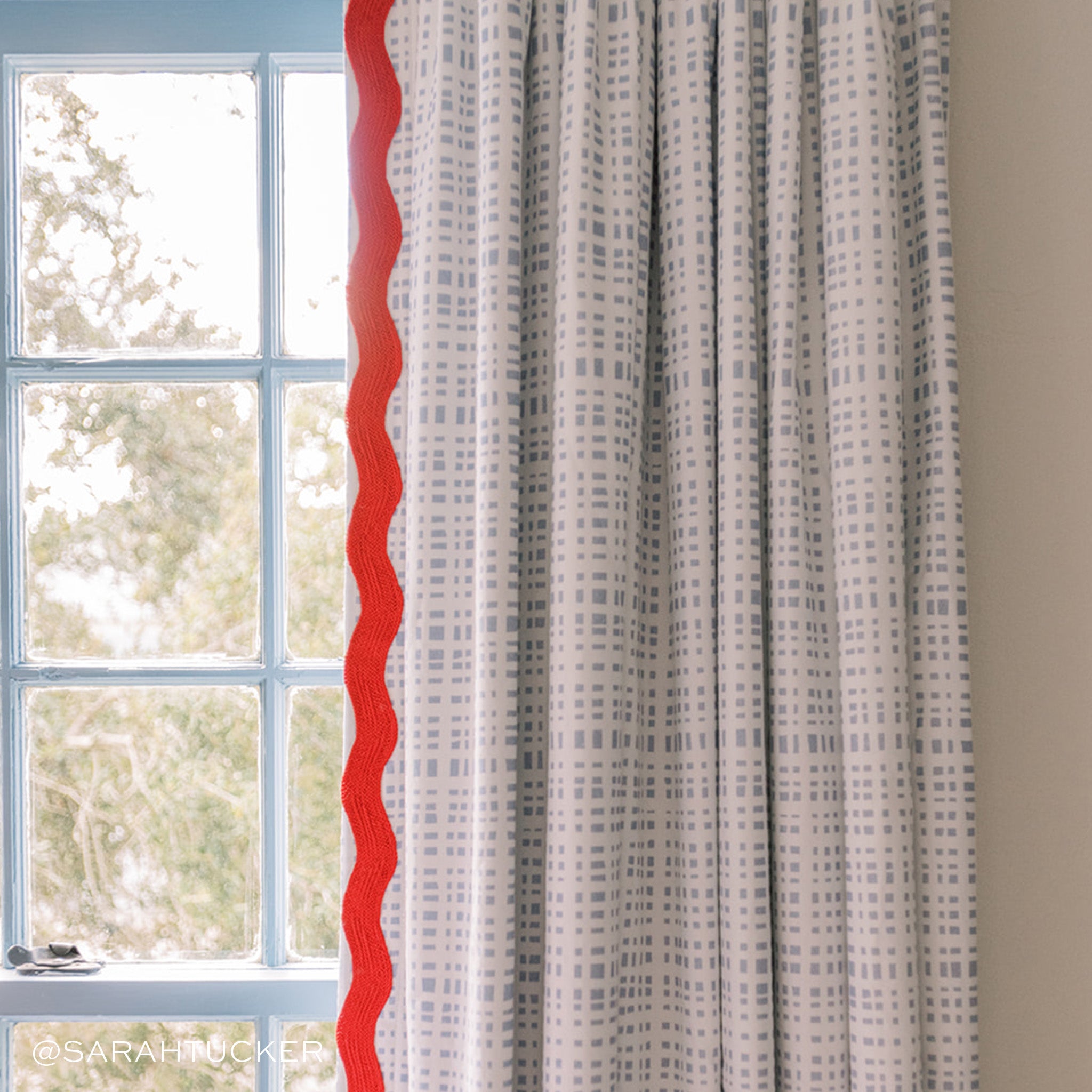 Ginger Curtains (Set of 2) in sky blue grid pattern with vibrant red trim, made-to-order in the USA with quick turnaround