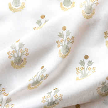 Lucie Chamomile fabric with soft yellow and sage floral motifs on white background, made-to-order, short lead times, manufactured in the USA
