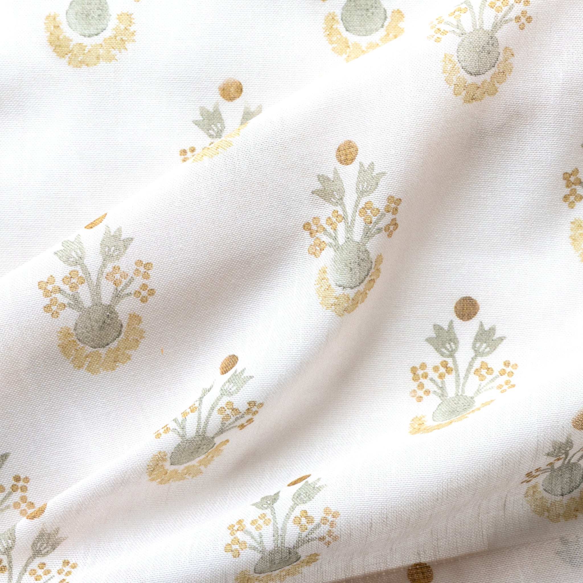 Lucie Chamomile fabric with soft yellow and sage floral motifs on white background, made-to-order, short lead times, manufactured in the USA