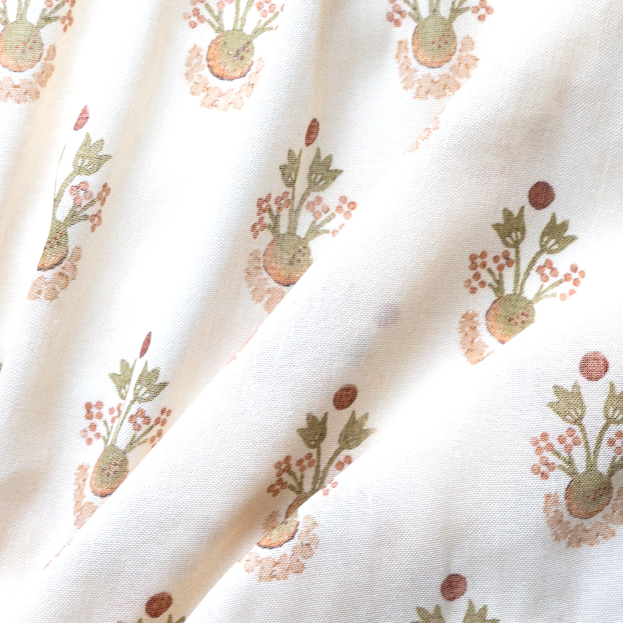 Lucie Clay fabric with soft green and muted terracotta botanical print on cream, made-to-order, short lead times, USA quality craftsmanship