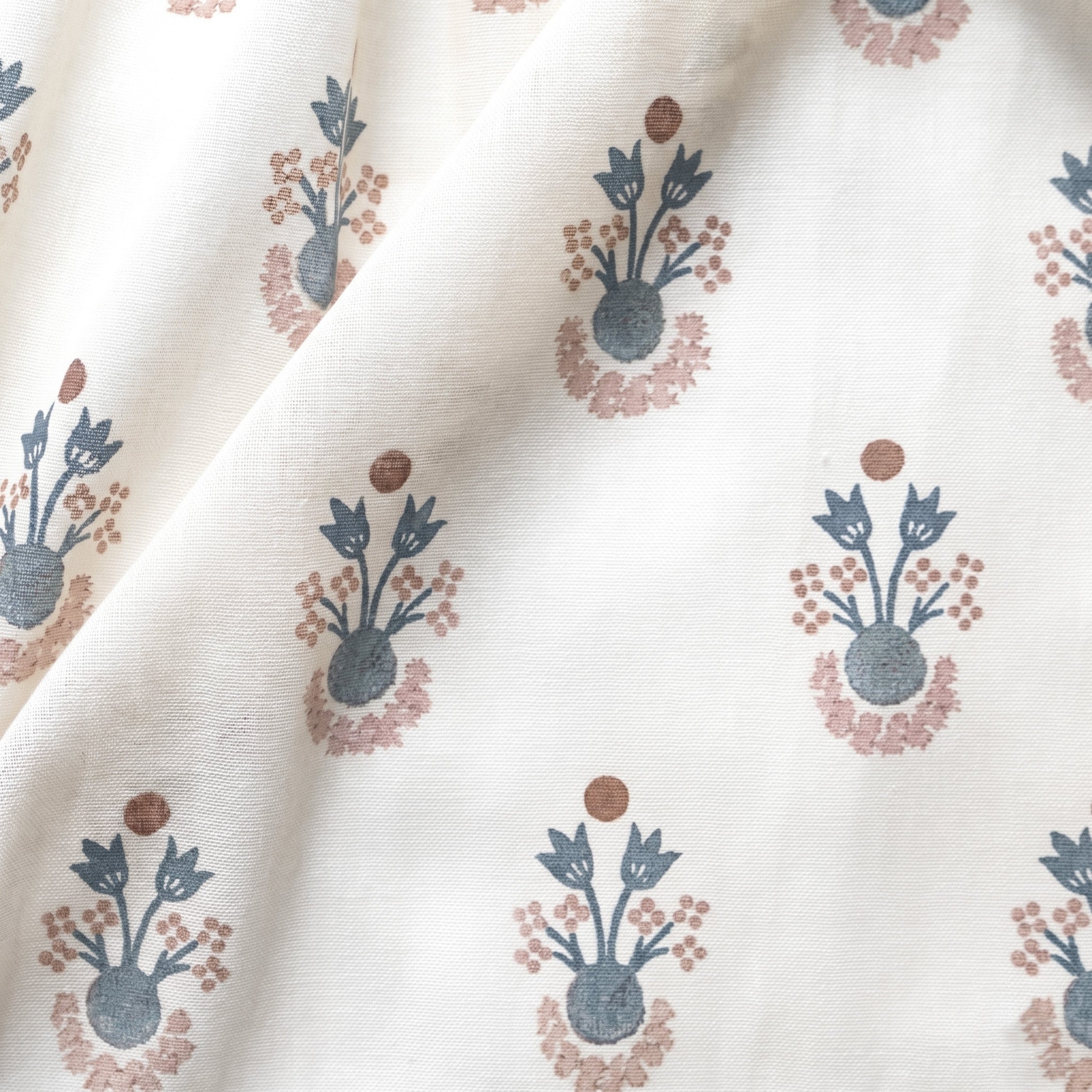 Lucie Harbor fabric featuring soft blue and muted rust floral motifs on sheer cream cotton, made-to-order, USA quality craftsmanship