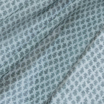 Quinn Baltic custom sheer fabric in muted blue with a delicate repetitive abstract print, made-to-order quality design