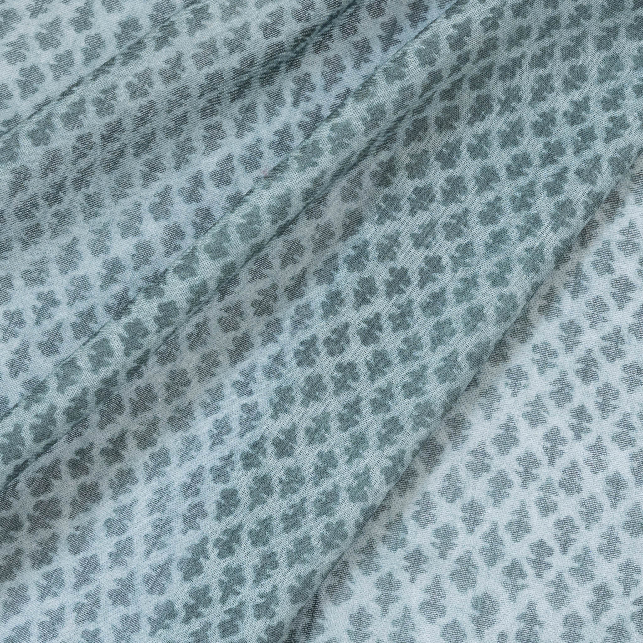Quinn Baltic custom sheer fabric in muted blue with a delicate repetitive abstract print, made-to-order quality design