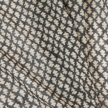 Quinn Charcoal custom fabric featuring a soft geometric floral pattern in charcoal and cream tones for made-to-order designs