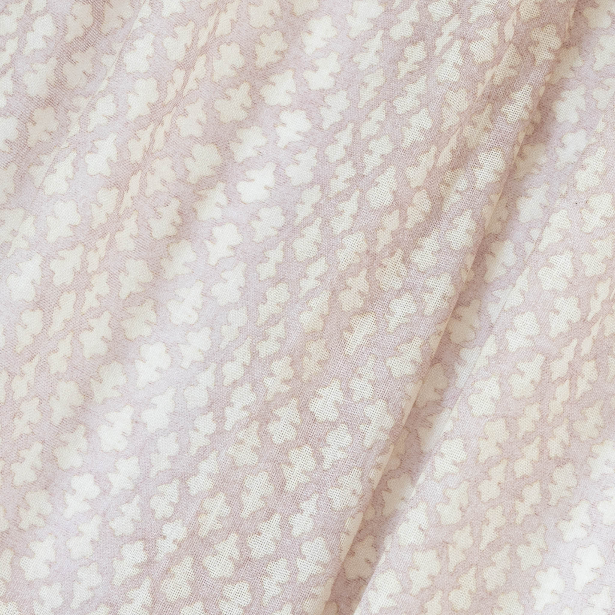 Quinn Wisteria custom sheer fabric in soft lavender gray with a delicate abstract floral pattern, made-to-order design