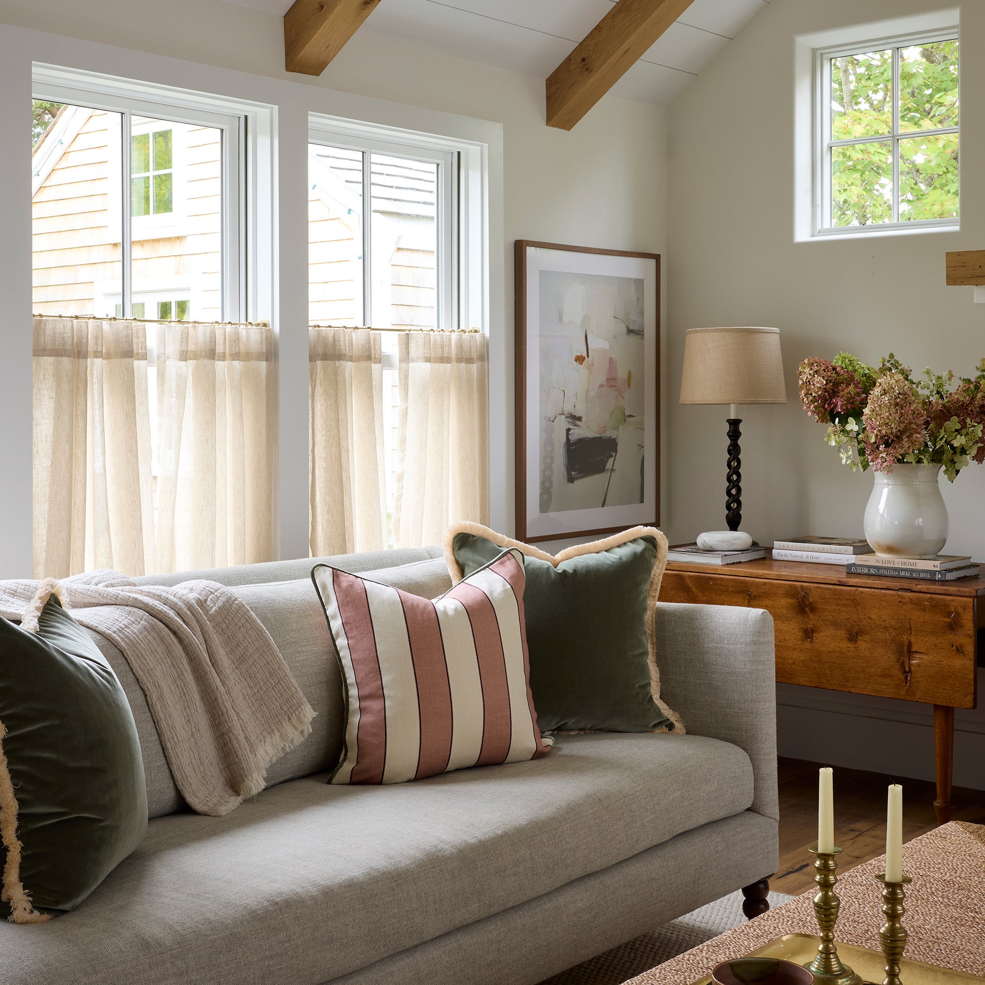 Light-filtering Florence Rosewood cafe curtains paired with plush pillows in a cozy living room, made-to-order, USA quality.