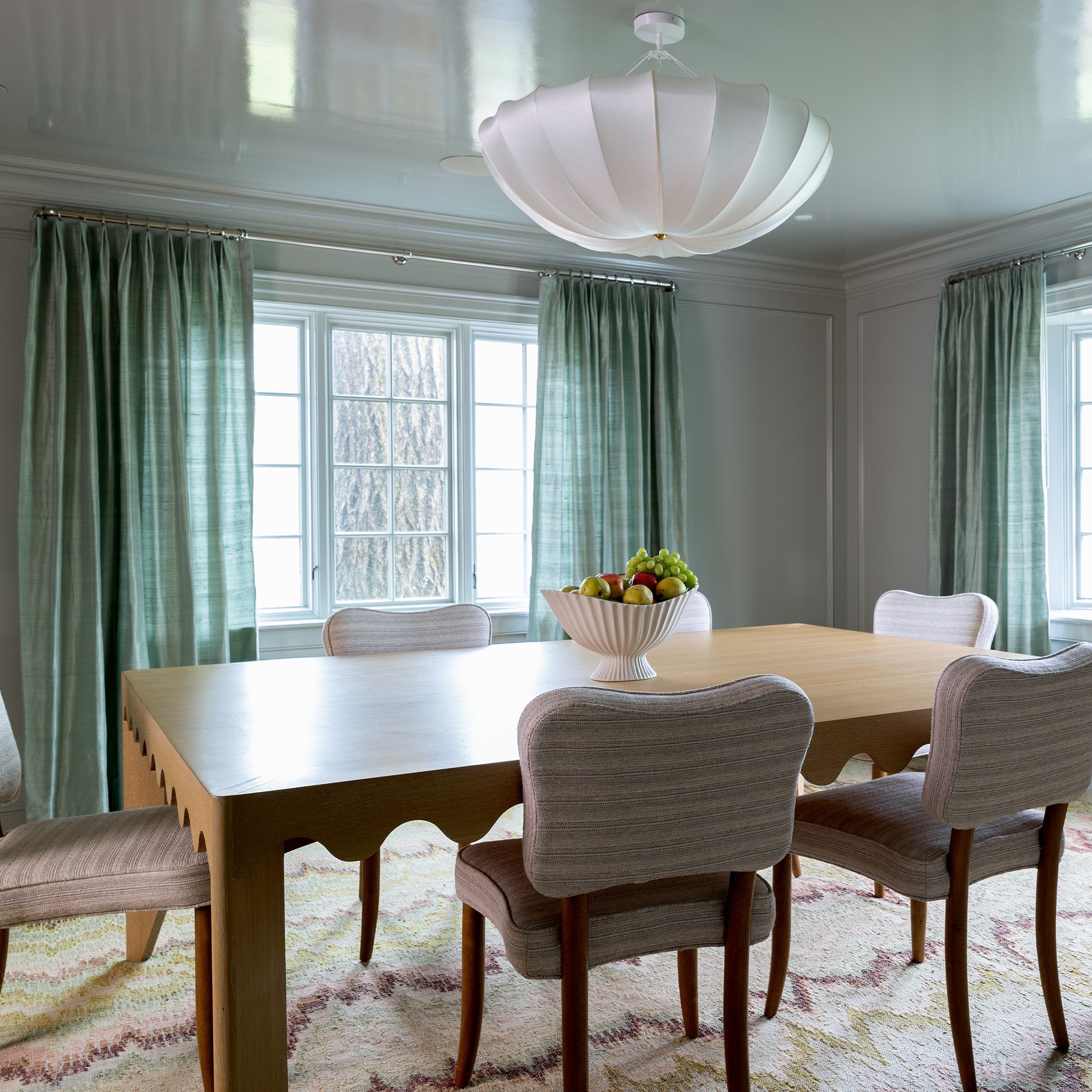 Dining room with Hemlock green curtains in soft fabric, made-to-order, short lead times, manufactured in the USA
