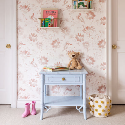 Blake Rose wallpaper with soft pink floral motifs in a nursery setting, made-to-order, short lead times, manufactured in the USA. FEATURED: Shown in Clay Coated