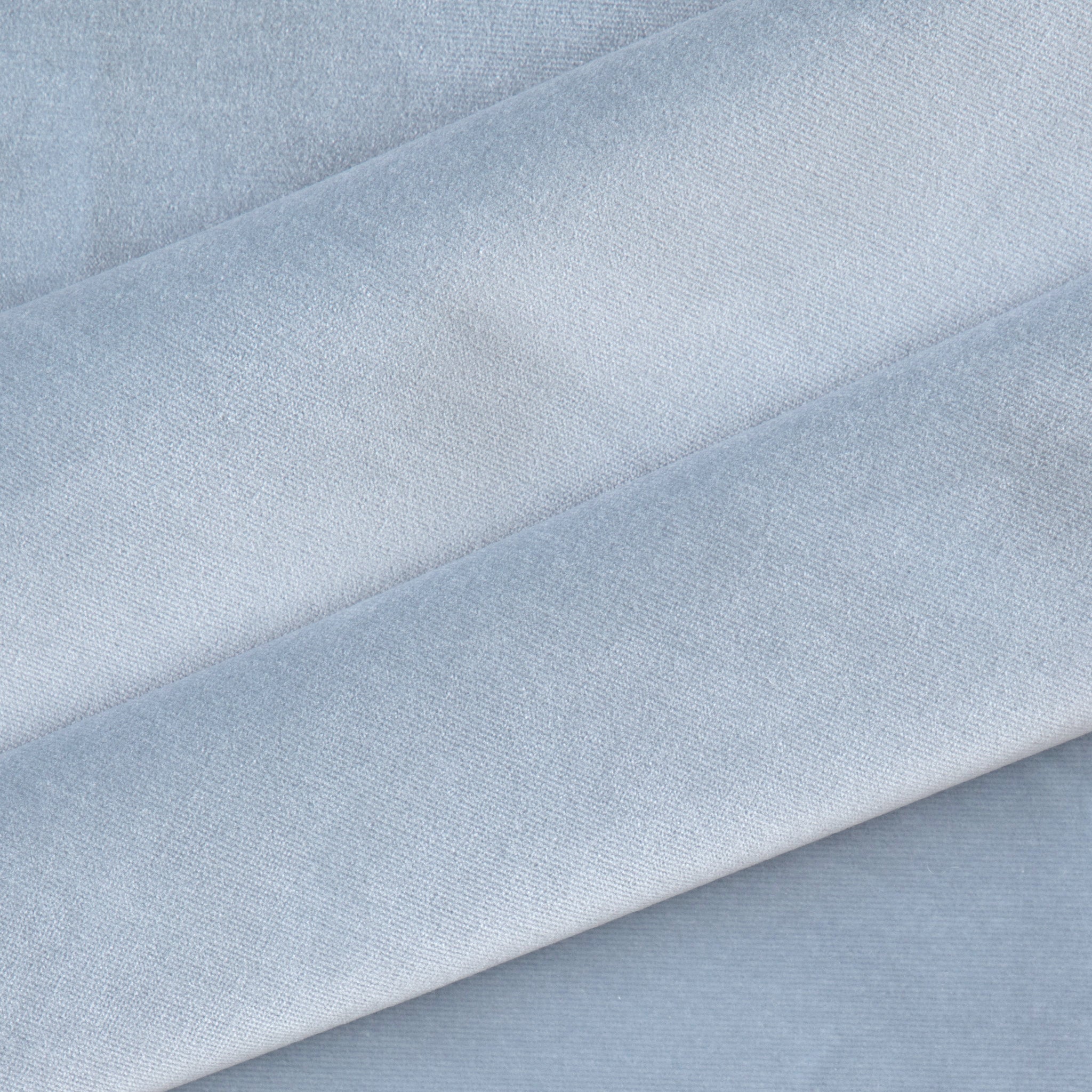 Sky made-to-order soft velvet fabric in serene blue tones, crafted in the USA with quick turnaround and quality craftsmanship