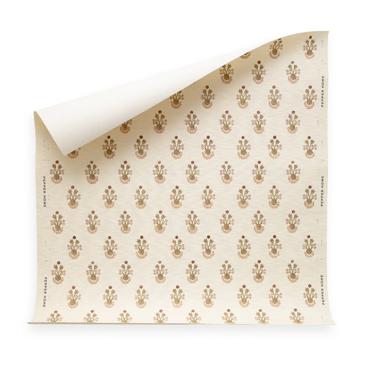 Lucie Clay wallpaper with a soft clay background and delicate floral motifs, customizable made-to-order design