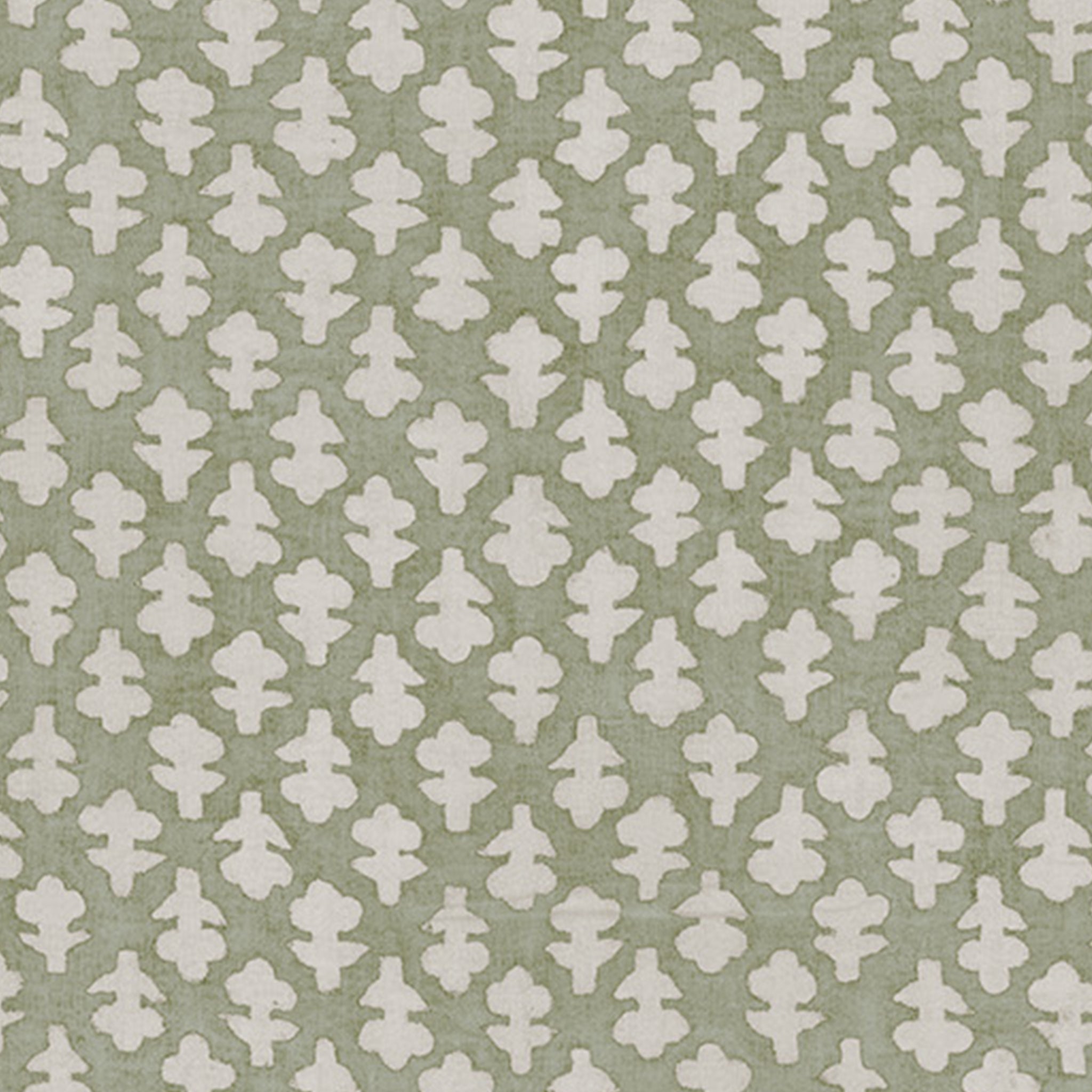 Quinn Eucalyptus fabric in soft green with a repeating white leaf pattern, customizable quality made-to-order design.