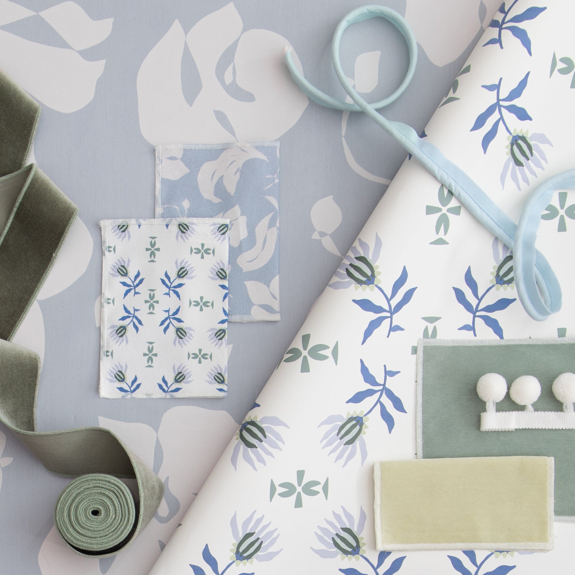 Lee fabric with soft blue and green botanical prints, coordinating trims, and velvety ribbons, made-to-order in the USA with short lead times